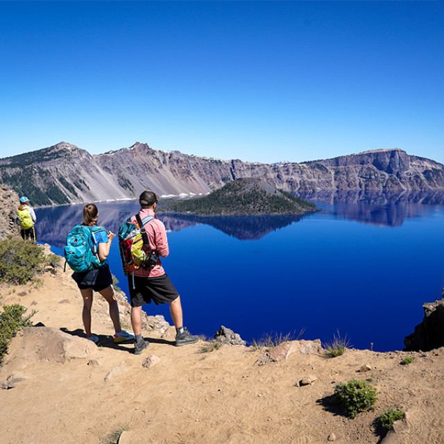 Gazing into the deep blue waters of Crater Lake in Crater Lake National Park, Oregon