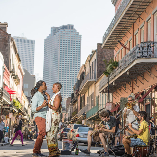 Street musicians perform for a crowd in New Orleans, Louisiana