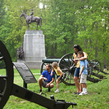 A family explores Gettysburg National Military Park in Gettysburg, Pennsylvania